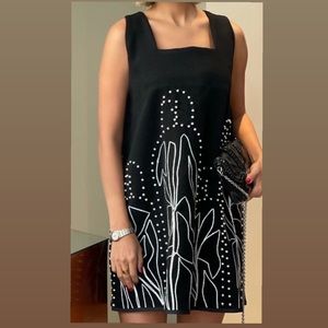 Black dress with pearls